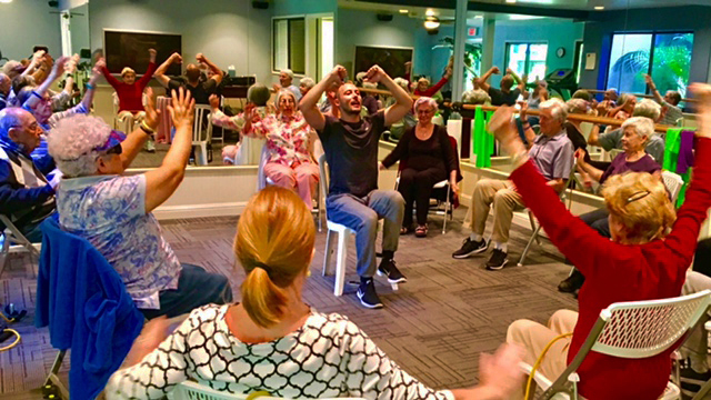 A workout session featuring Live 2 B Healthy trainer and a number of residents at The Heritage Downtown, in their workout facility, located in Walnut Creek, California