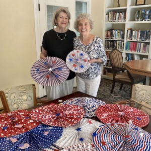 People showing off 4th of July decorations