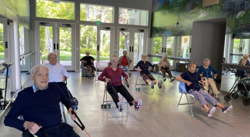 Seniors doing chair Fitness