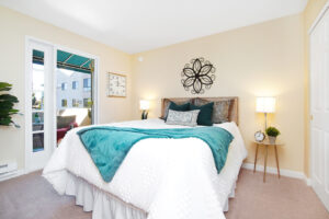 Bedroom with staged furniture