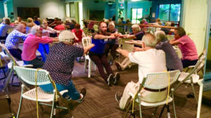 Health & Vitality Wellness class, with The Heritage Downtown residents seated and working out